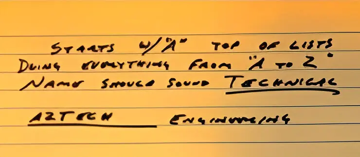 Handwritten notes about technical company name.